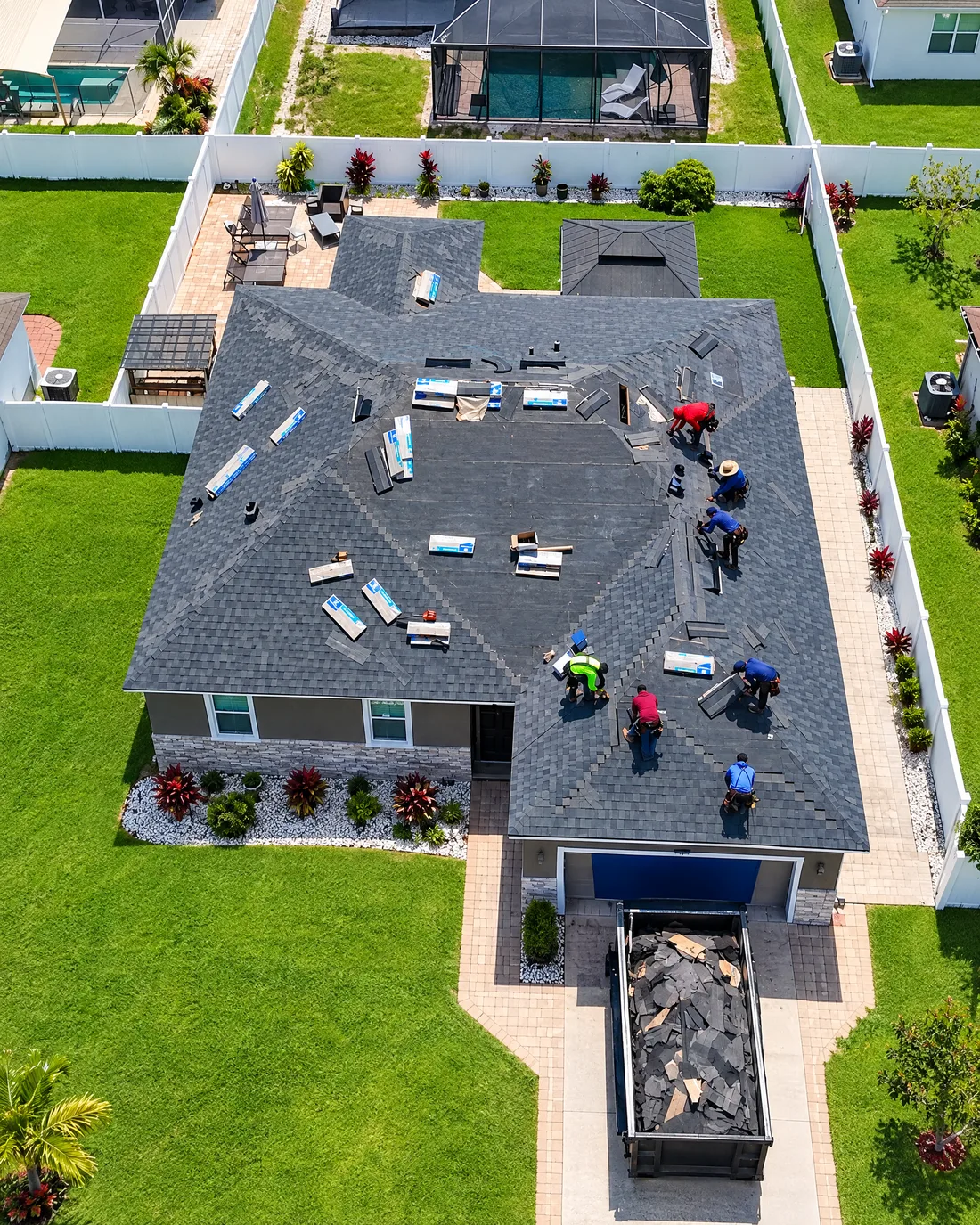 NexRoof crew installing a new shingle roof on a Tampa Bay home